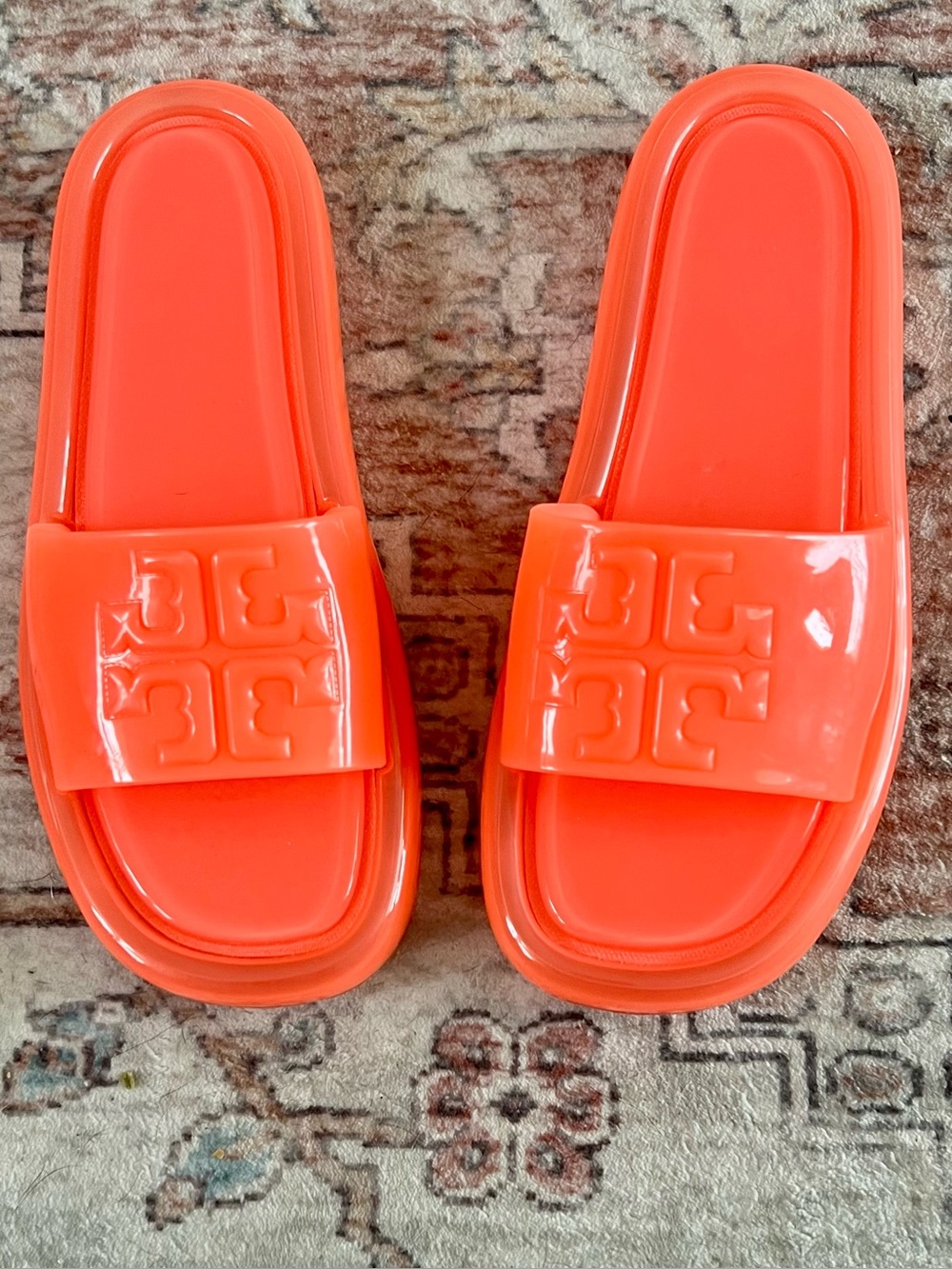 Tory Burch women’s Bright Coral Logo Slide Sandals